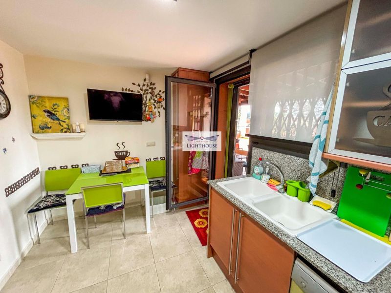 Апартаменты на нижнем этаже в престижном комплексе.