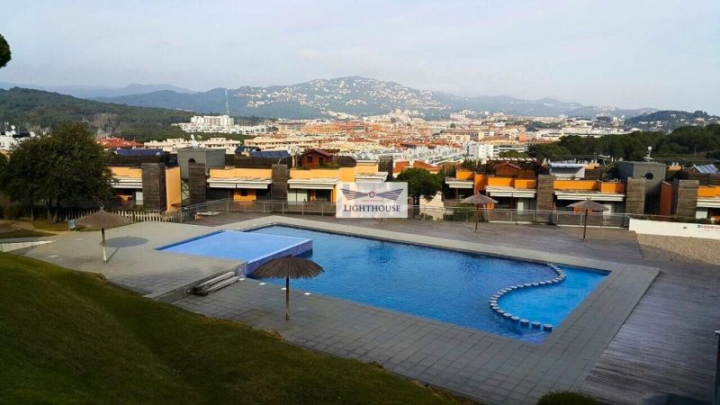 Апартаменты на нижнем этаже в престижном комплексе.