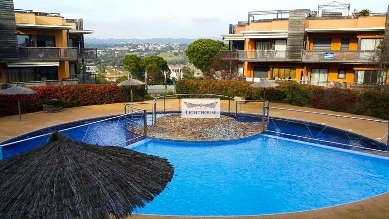 Апартаменты на нижнем этаже в престижном комплексе.